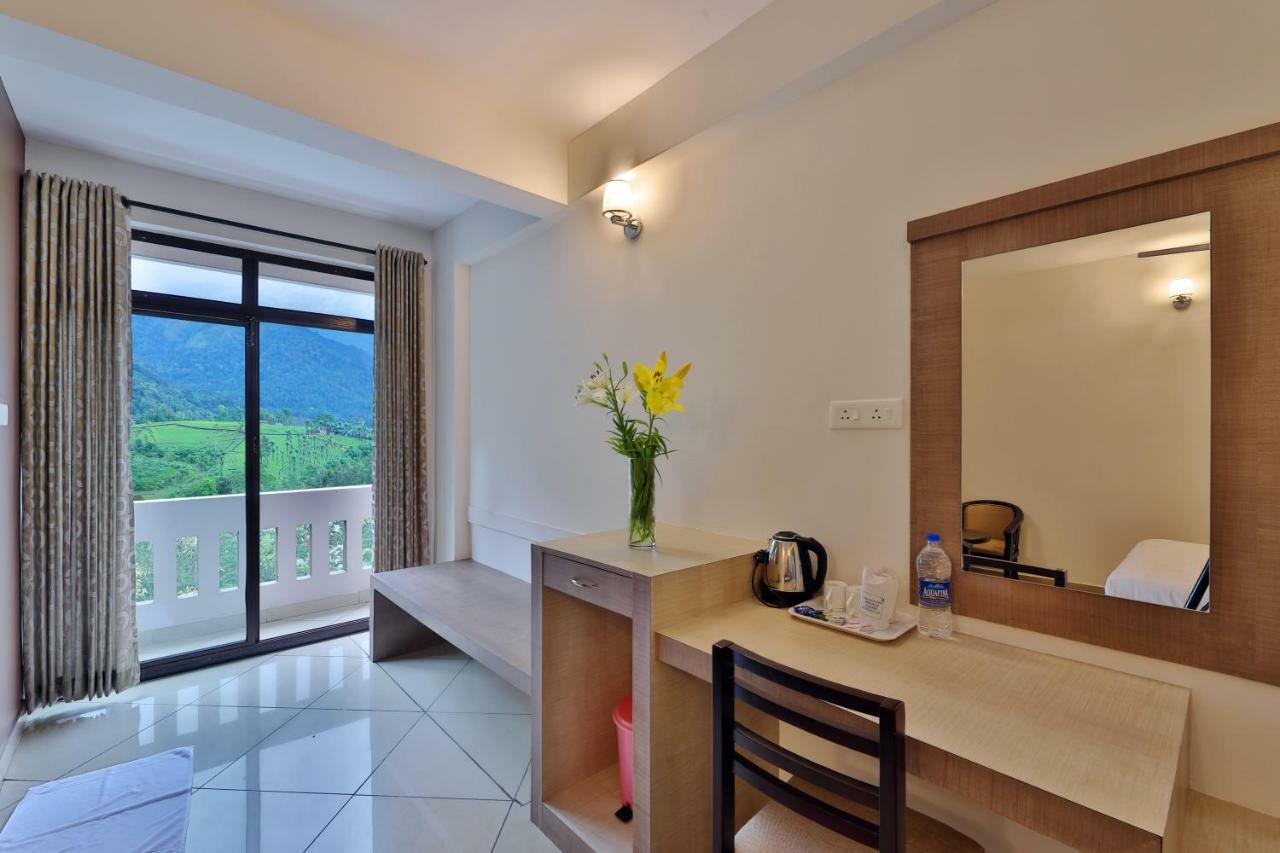 Tea Castle Munnar Hotel Bagian luar foto